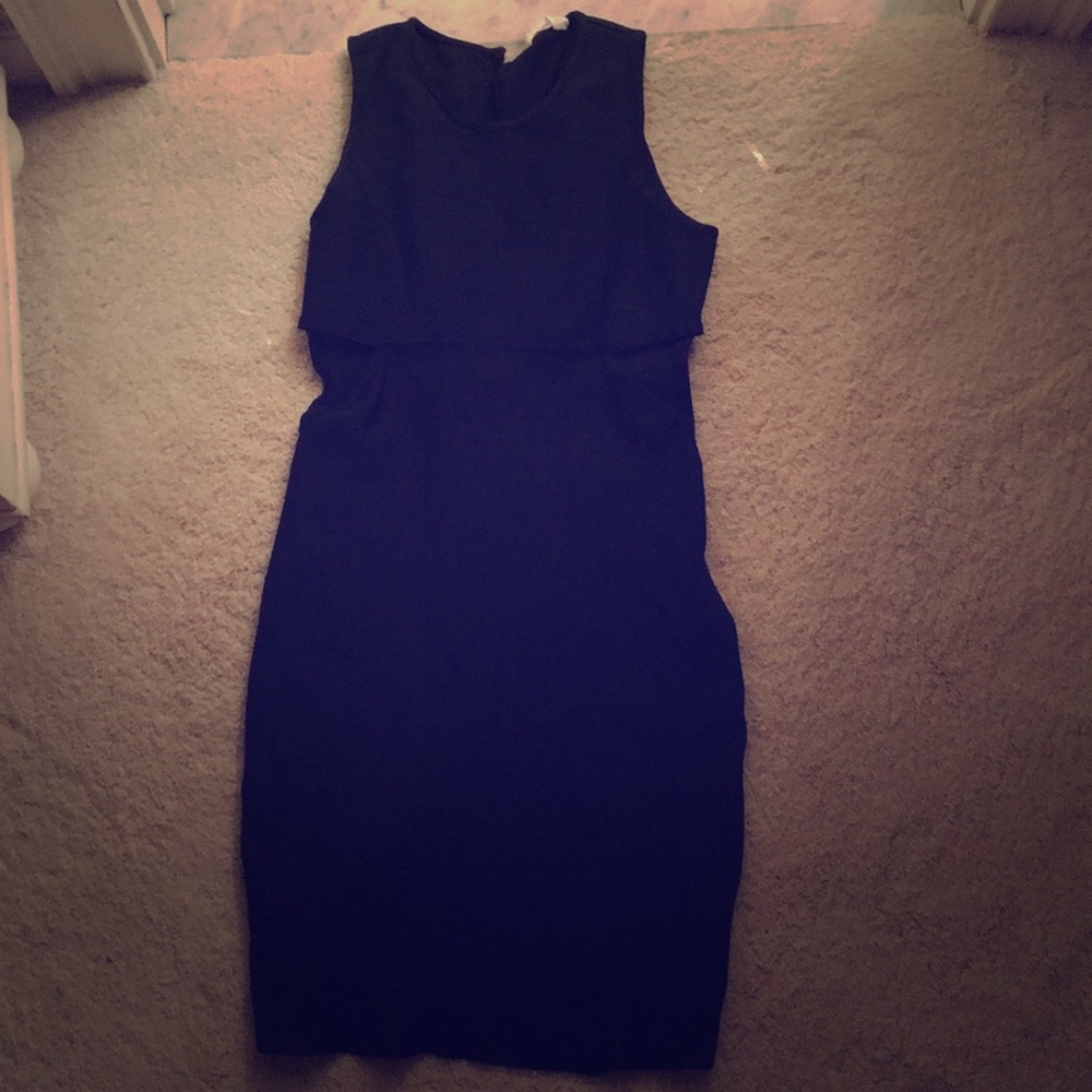 Black dress with cutouts on the waist